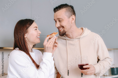 Happy couple drinking wine ...