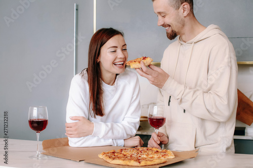 Happy couple drinking wine ...