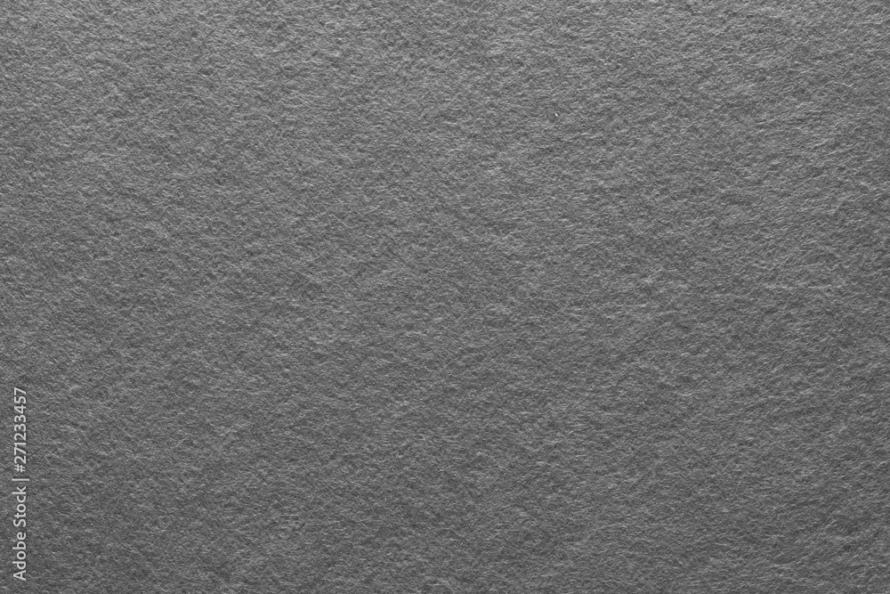 Fototapeta premium Gray felt texture abstract art background. Colored fabric fibers surface. Empty space.