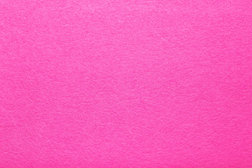 Hot pink felt texture abstract art background. Colored fabric fibers surface. Empty space.