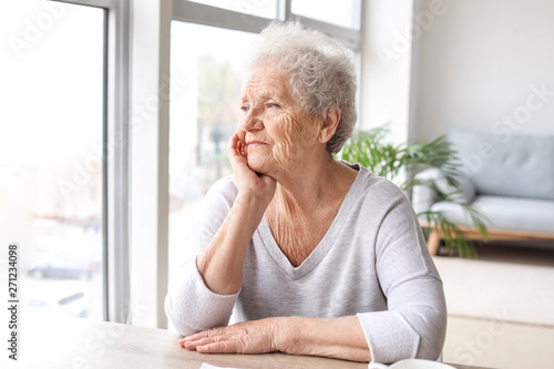 Portrait of senior woman at...