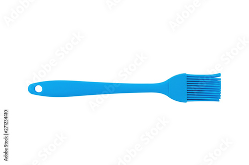 Blue rubber or silicone brush with plastic handle for confectionery isolated on white background. Top view