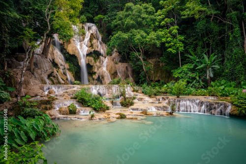 The Kuang Si Falls sometimes spelled Kuang Xi or known as Tat Kuang Si Waterfalls located in Luang Prabang, Laos