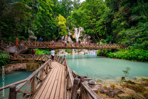 The Kuang Si Falls sometimes spelled Kuang Xi or known as Tat Kuang Si Waterfalls located in Luang Prabang, Laos