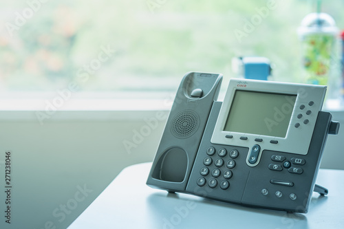 Close up soft focus on ip phone devices at office desk