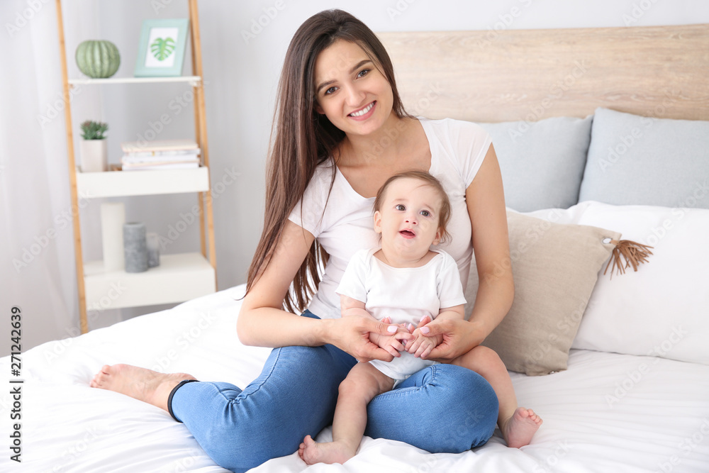 Happy mother with cute little baby at home Happy mother with cute little baby at home