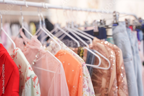 Canvas Print fashion stylish clothes hanging on hangers in the store. nobody.