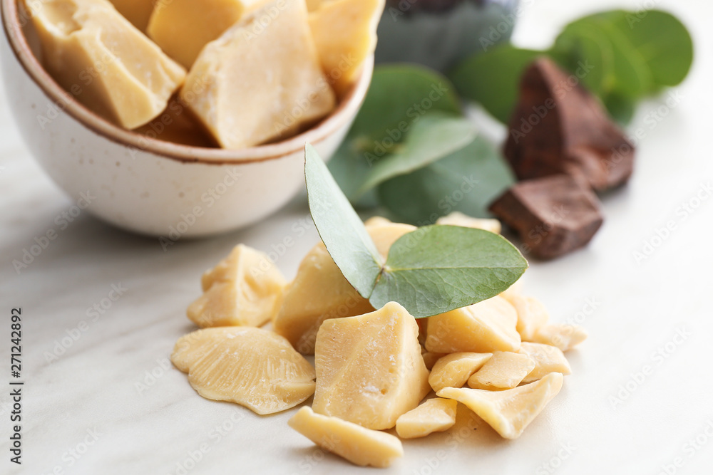 Pieces of cocoa butter on table Pieces of cocoa butter on table