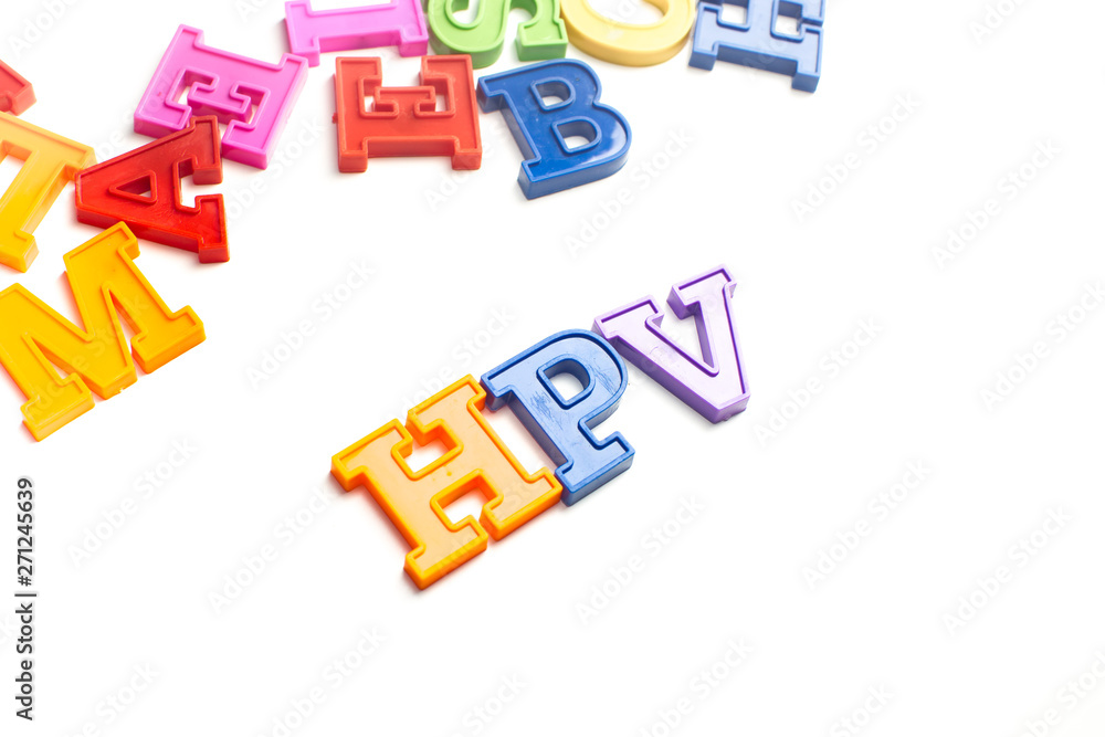 Obraz premium Heap of plastic colored alphabet letters close up. HPV