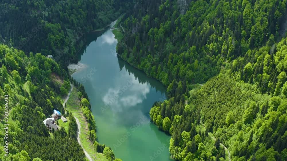 Aerial drone shot over a reservoir lake in the mountains Aerial drone shot over a reservoir lake in the mountains