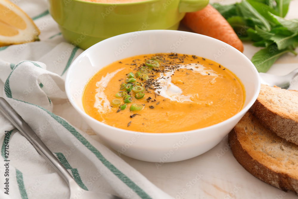 Bowl of tasty cream soup on table Bowl of tasty cream soup on table