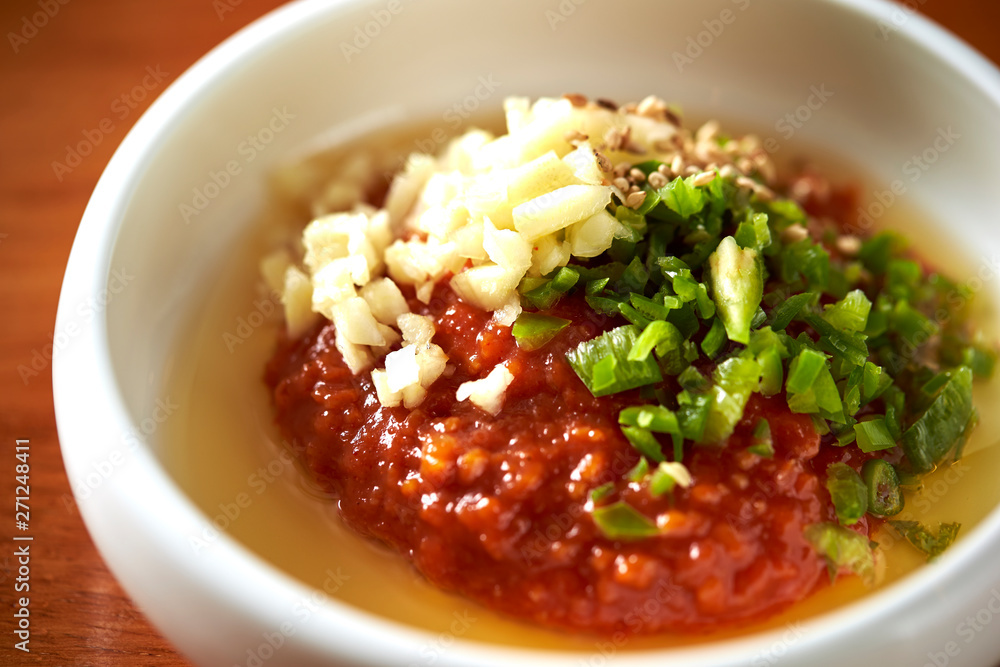 Korean chili paste sauce with sesame and spring onion Korean chili paste sauce with sesame and spring onion