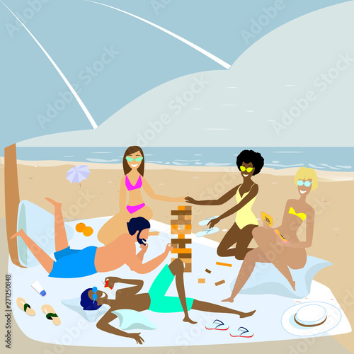 Friends are playing jenga game on the beach