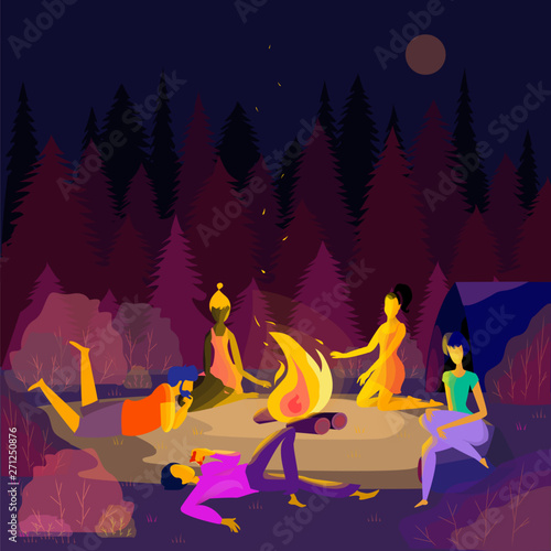 Company of friends organized a campfire in forest