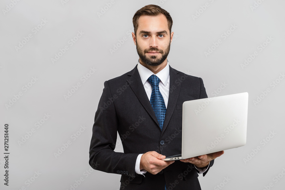 Attractive young businessman wearing suit Attractive young businessman wearing suit