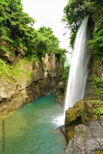 waterfall in deep forest at japan