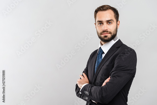 Attractive young businessman wearing suit photo