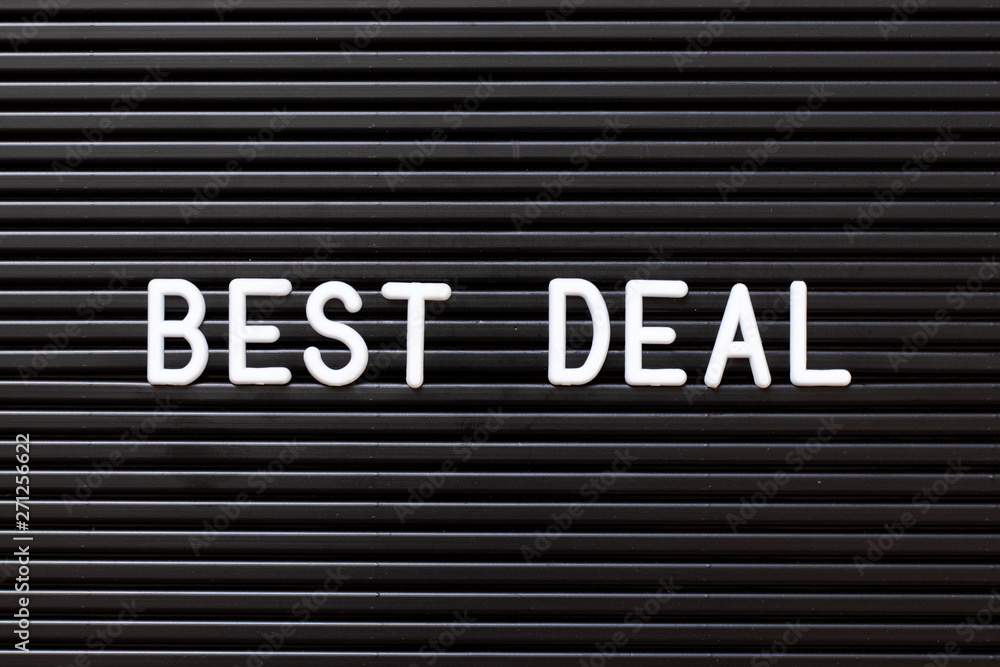 Black color felt letter board with white alphabet in word best deal background Black color felt letter board with white alphabet in word best deal background