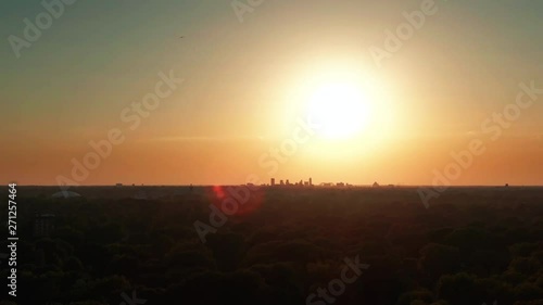 City Skyline At Sunset Golden Hour Aerial Zoomed In