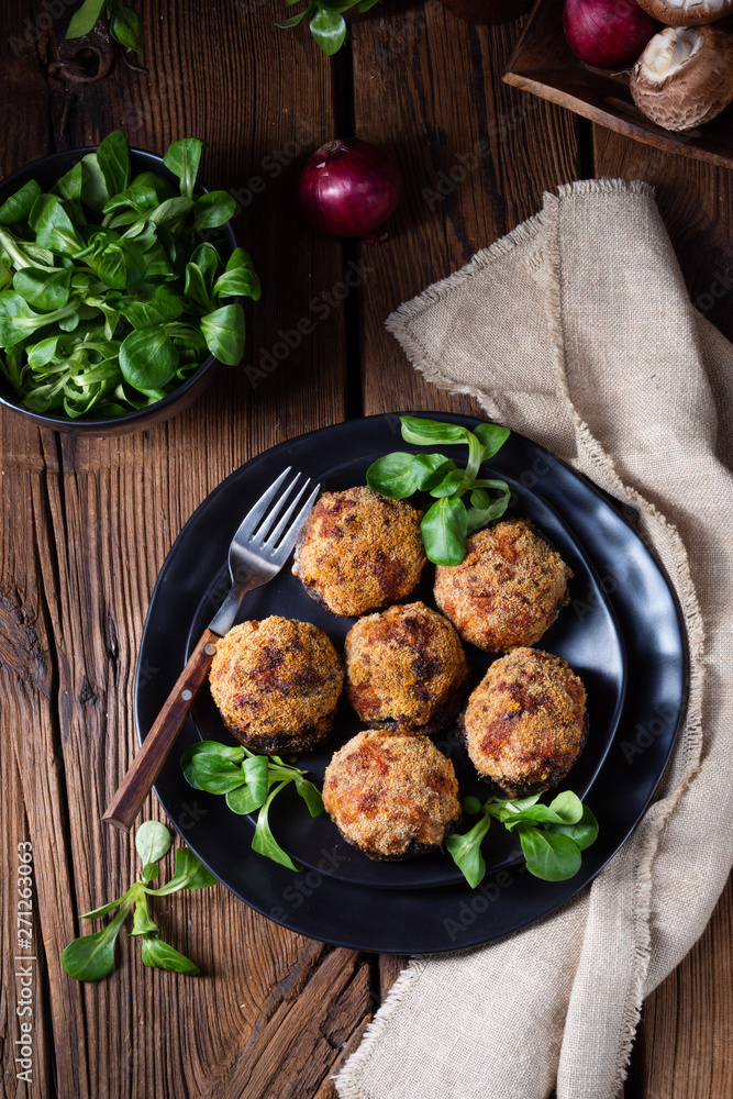 stuffed with minced meat and baked Champignons stuffed with minced meat and baked Champignons