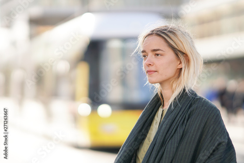 Canvas Print Woman with public transportation in Berlin, Germany