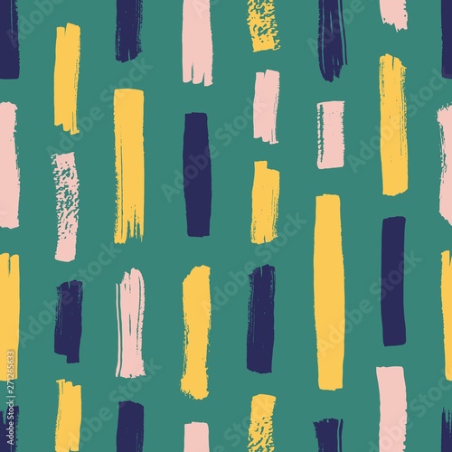 Creative seamless pattern with vivid paint traces or smudges on green backgro...