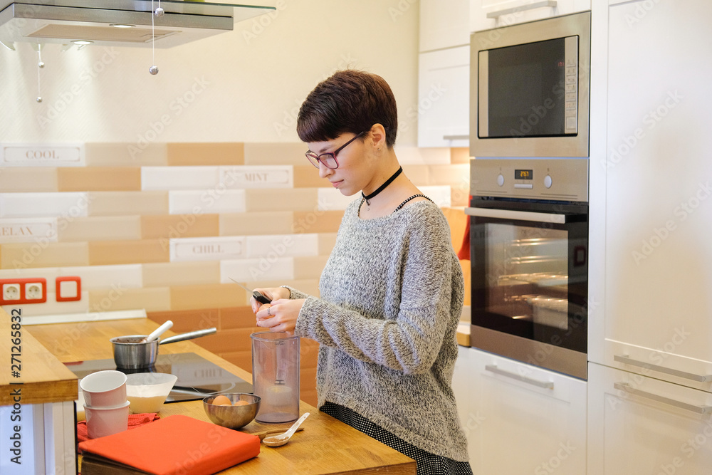 Portrait of woman cooking dessert. Portrait of woman cooking dessert.