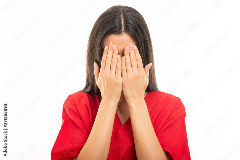 Portrait of nurse wearing scrubs covering eyes like blind concept Portrait of nurse wearing scrubs covering eyes like blind concept