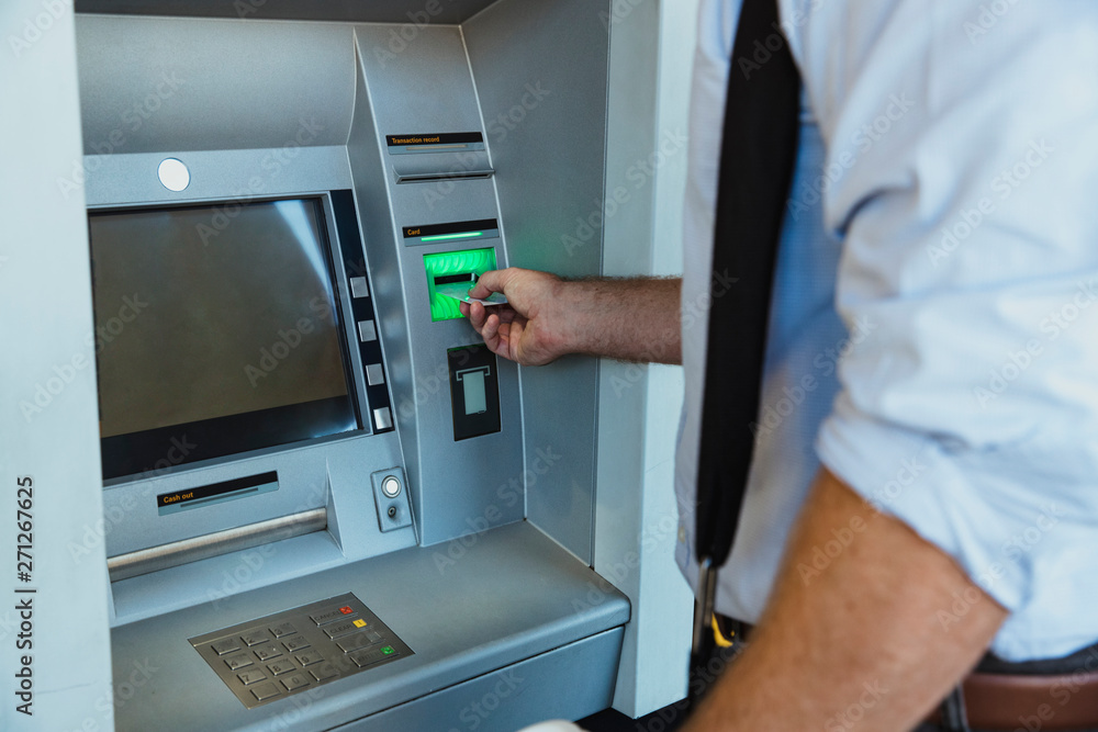 Withdrawing Money from ATM Machine Withdrawing Money from ATM Machine