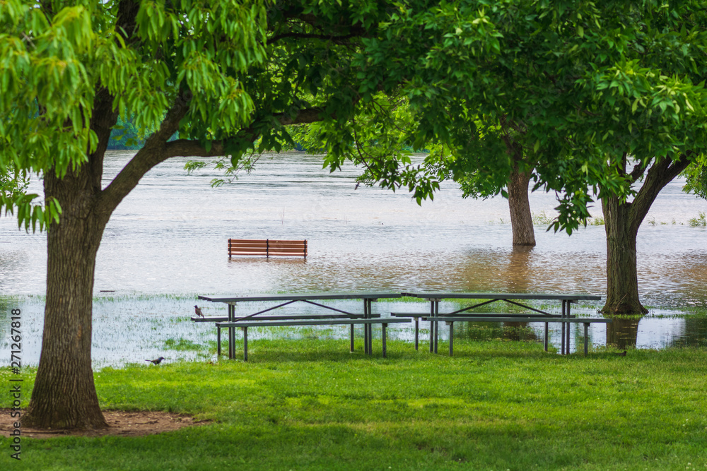 Heavy spring rains flood parks and communities as rivers rise. Heavy spring rains flood parks and communities as rivers rise.