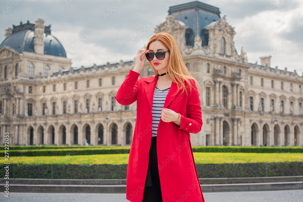 Fototapeta premium Holidays in Paris, France. Fashionable pretty woman rest in centre of city, concept of vacation. Lady in casual style at street