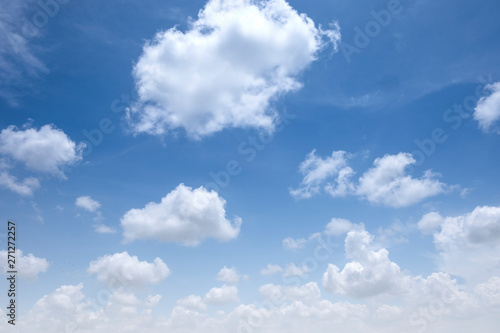 Beautiful white clouds with blue sky.Color shade gradient from white to blue for background wallpaper.