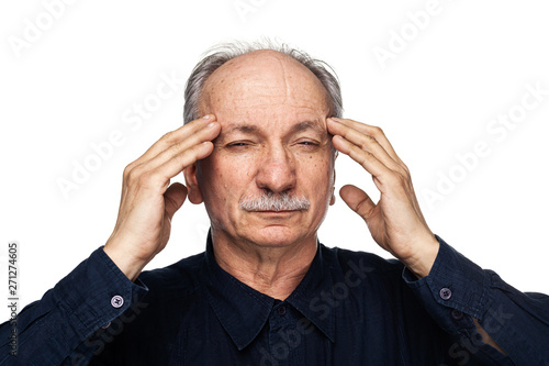 Elderly man suffers from headache