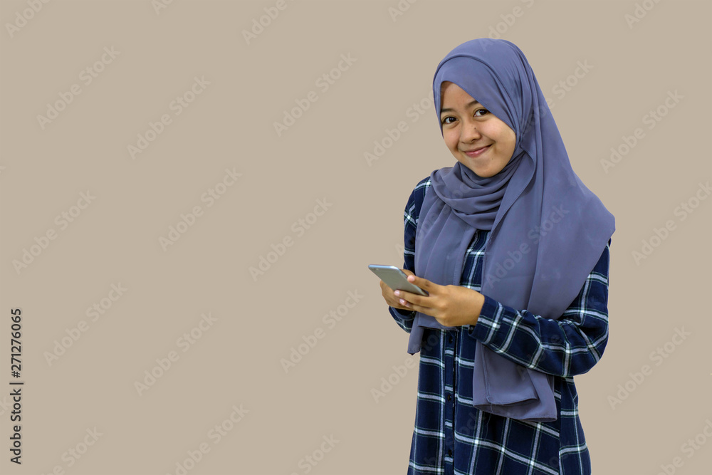 portrait of a veiled woman She stands right in front of the camera smiling and looking happy portrait of a veiled woman She stands right in front of the camera smiling and looking happy