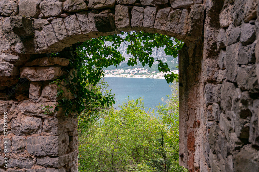 The ruins of an old abandoned Catholic church Stara Zupna Crkva on Mount Vrmac, the town of Prcanj, the Bay of Kotor, Montenegro.