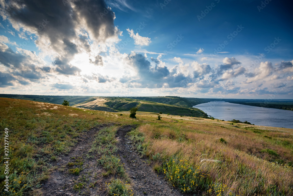 Naklejka premium Amazing view of summer steppe with lake beautiful landscape