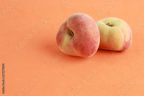 Paraguayan peach on colorful background photo