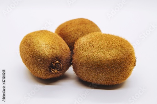 Ripe kiwi fruit on white background