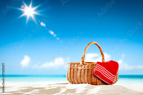 Summer basket on beach and picnic time. Free space for your decoration. 