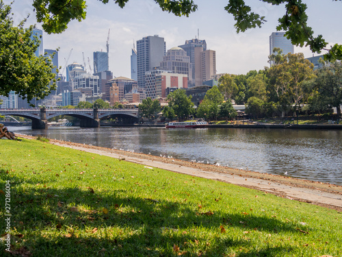 The amazing Melbourne skyline from the shores of the river Yarra, Melbourne, South Australia photo