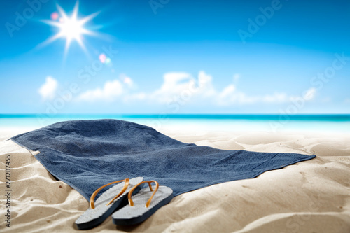 Summer towel on beach and free space for your decoration. 
