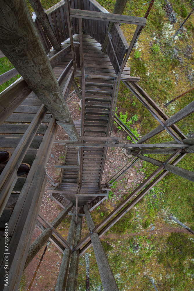 Scenic viewing tower with wooden material in summer Scenic viewing tower with wooden material in summer