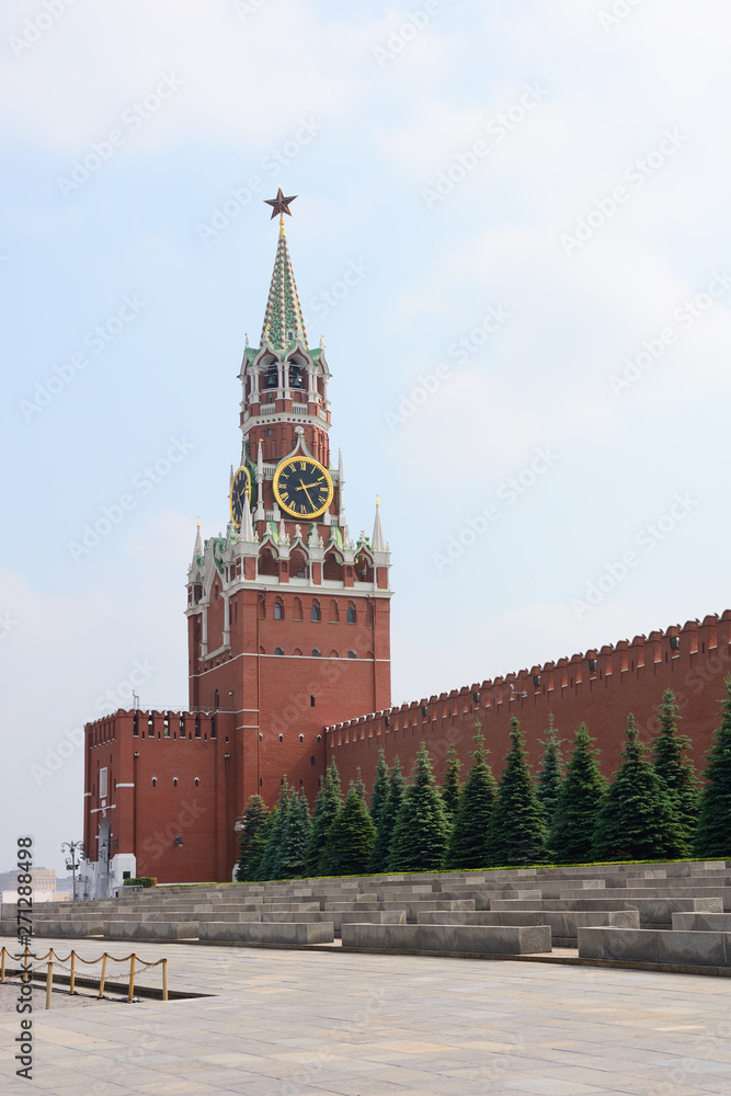 Spasskaya Tower and wall of the Kremlin in the city of Moscow