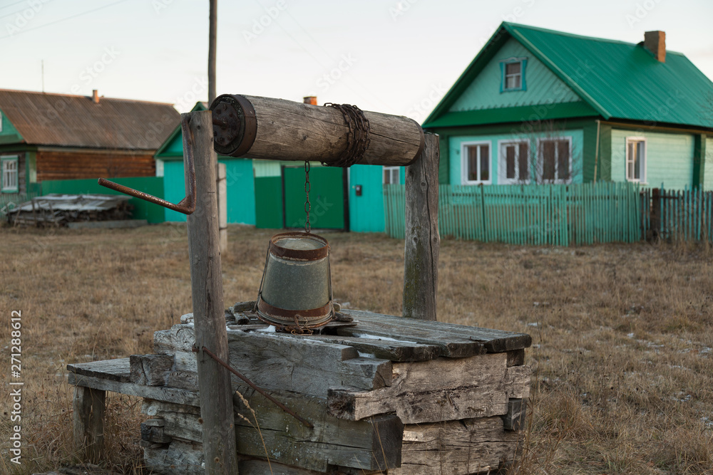 Old house and well in the village of Mariets, Republic of Mariel