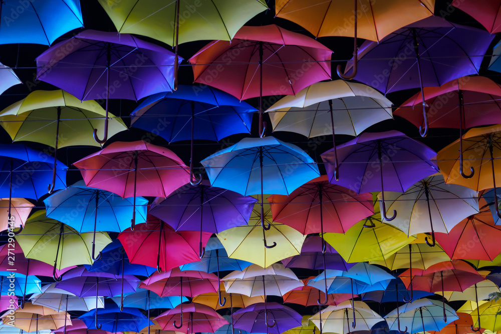 Colors umbrella with night sky background decorate in city Odessa, Ukraine