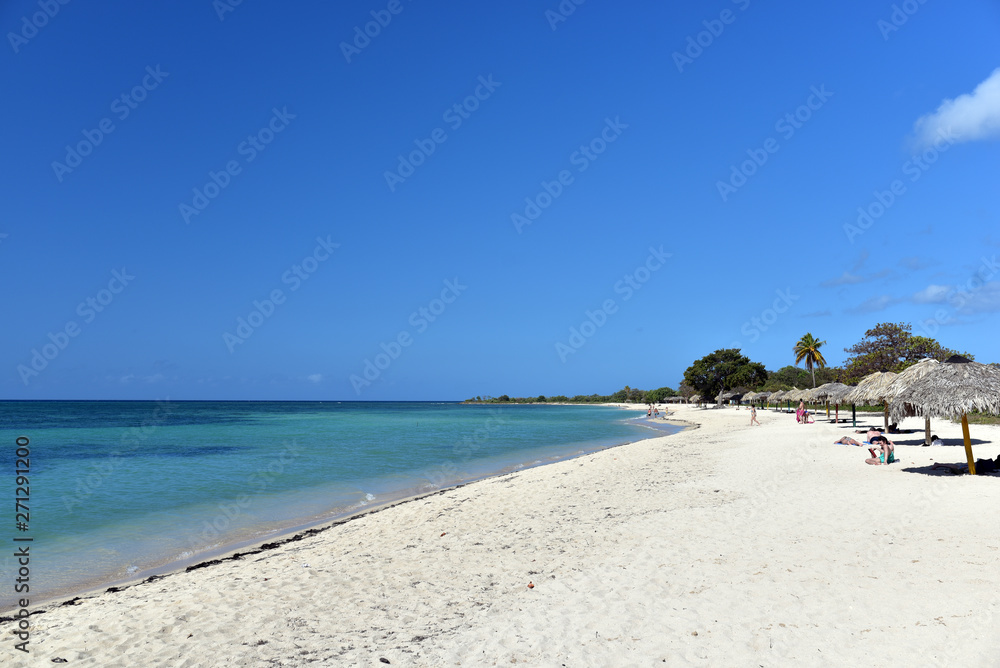Sunbathers at Playa Ancon Beach in Trinidad, Cuba
