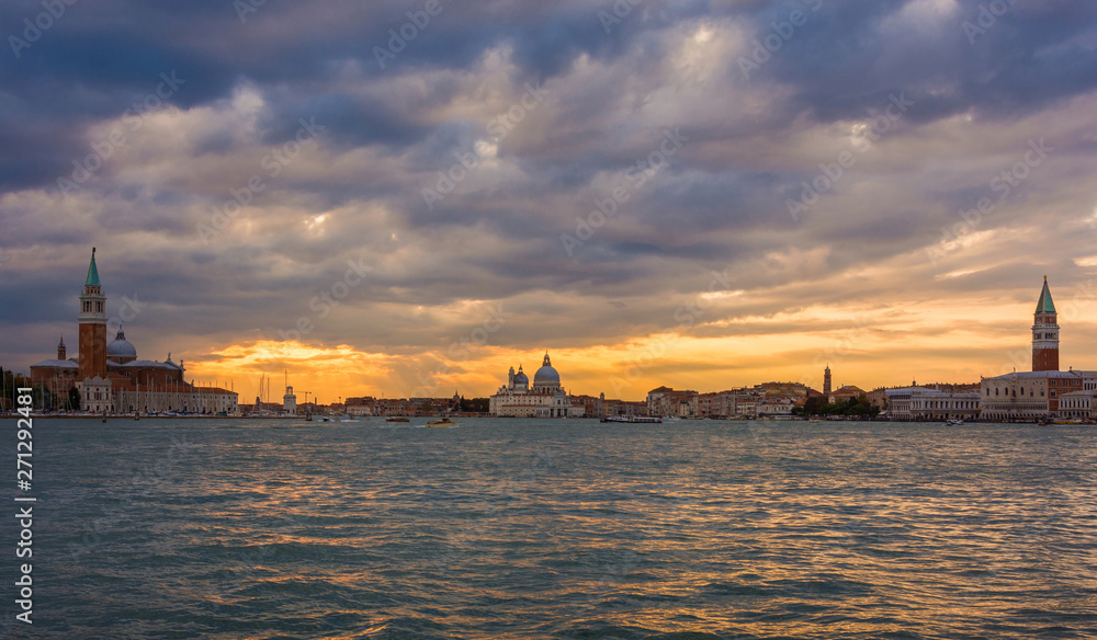 Beautiful sunset over Venice Lagoon with stormy clouds