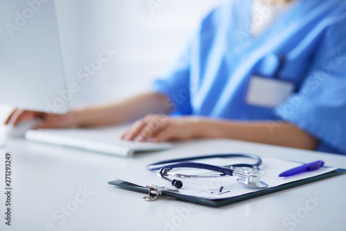 Stethoscope on desk. Doctor working in hospital. Healthcare and medical concept