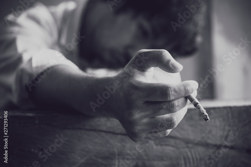 Asian Stress man smoking,Thailand people,No tobacco day concept,DIe from smoke smoking cigarette
