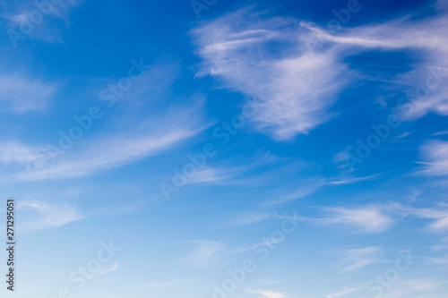Cirrus cloud on blue sky background.